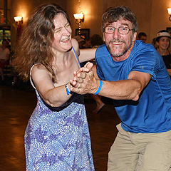 Two contra dancers, clearly loving it!