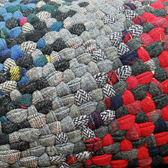 Closeup of a braided wool rug by Sharon Zook
